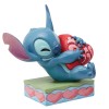 Enesco - Tradizione Disney di Jim Shore - Lilo e Stich - Stitch che coccola un cuore