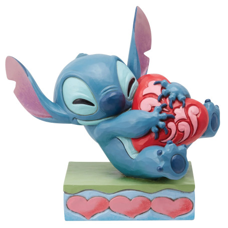 Enesco - Tradizione Disney di Jim Shore - Lilo e Stich - Stitch che coccola un cuore