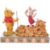 Enesco - Winnie the Pooh - Jumping into Fall - Disney Tradition di Jim Shore
