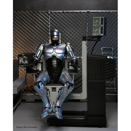 Neca - RoboCop - Ultimate Battle Damaged RoboCop con sedia