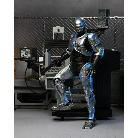 Neca - RoboCop - Ultimate Battle Damaged RoboCop con sedia