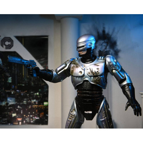 Neca - RoboCop - Ultimate Battle Damaged RoboCop con sedia