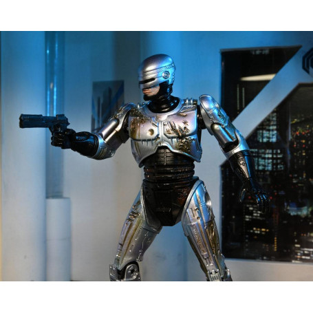 Neca - RoboCop - Ultimate Battle Damaged RoboCop con sedia