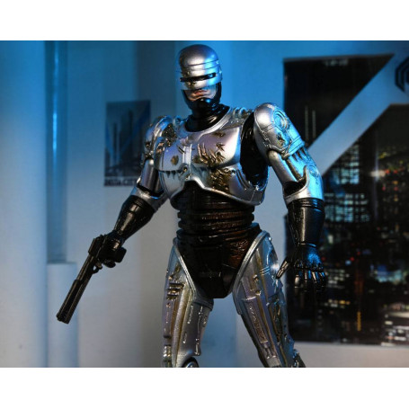 Neca - RoboCop - Ultimate Battle Damaged RoboCop con sedia